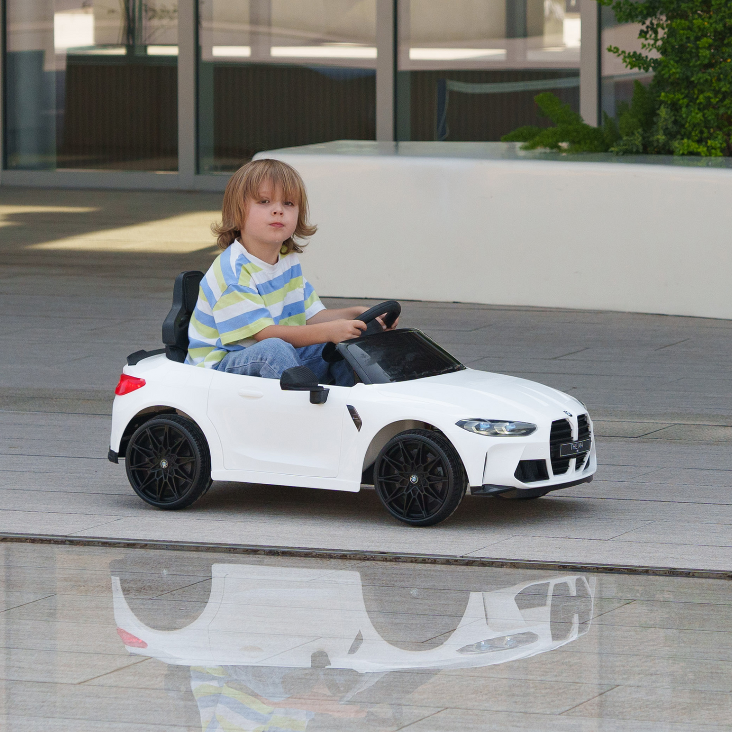 12V BMW M4 Licensed Kids Car with Easy Transport, Remote Control, Suspension, Music, Horn, LED Lights in White by AIYAPLAY