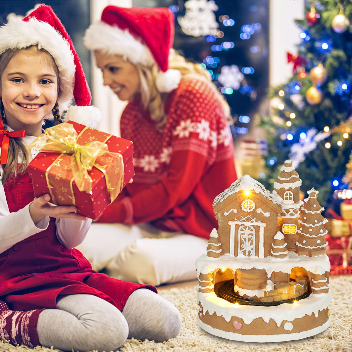 HOMCOM Christmas Gingerbread House, Lighted Musical Snow Village with Rotating Train, LEDs, Tunes, Battery Operated