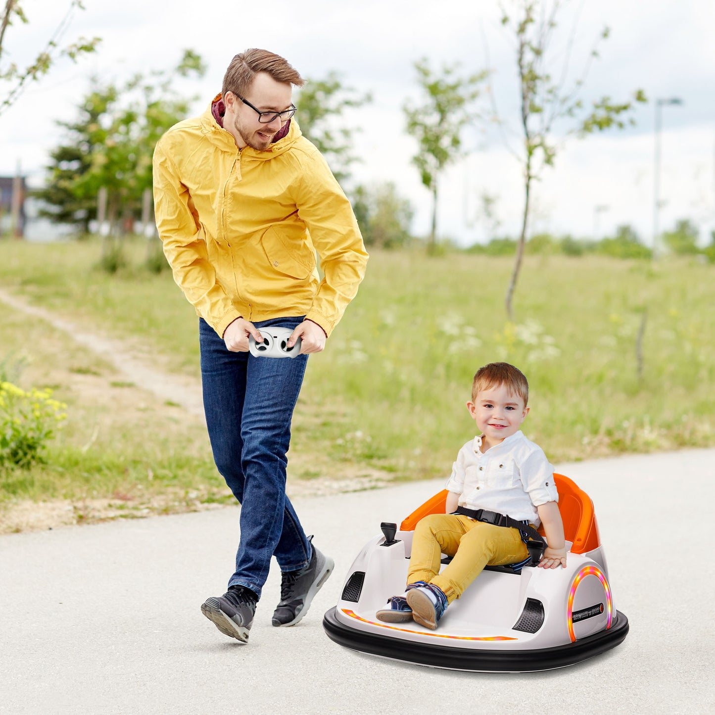 AIYAPLAY 360Â° Rotation Kids Bumper Car, 12V Waltzer Car with Remote Control, Dual Joysticks, Music Lights, Orange