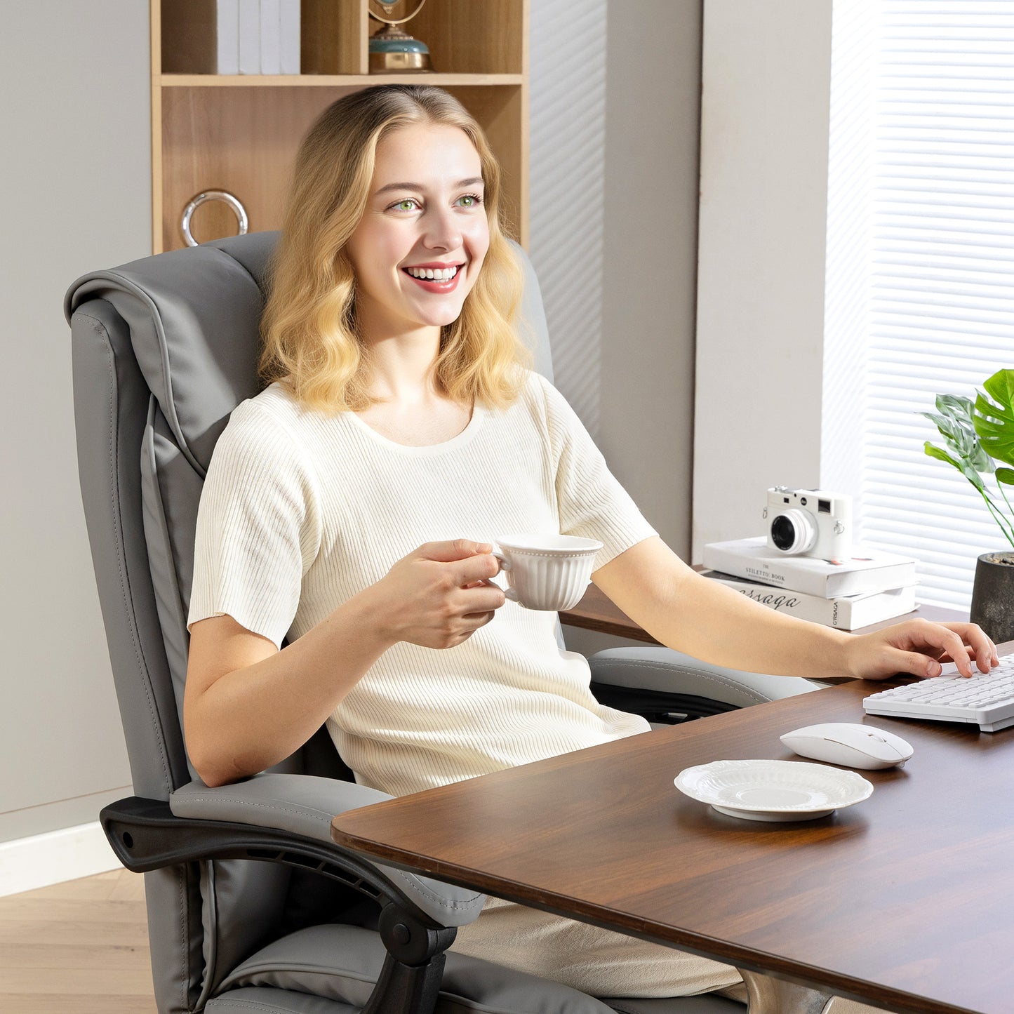 HOMCOM 155Â° Reclining Faux Leather Swivel Office Chair -Black