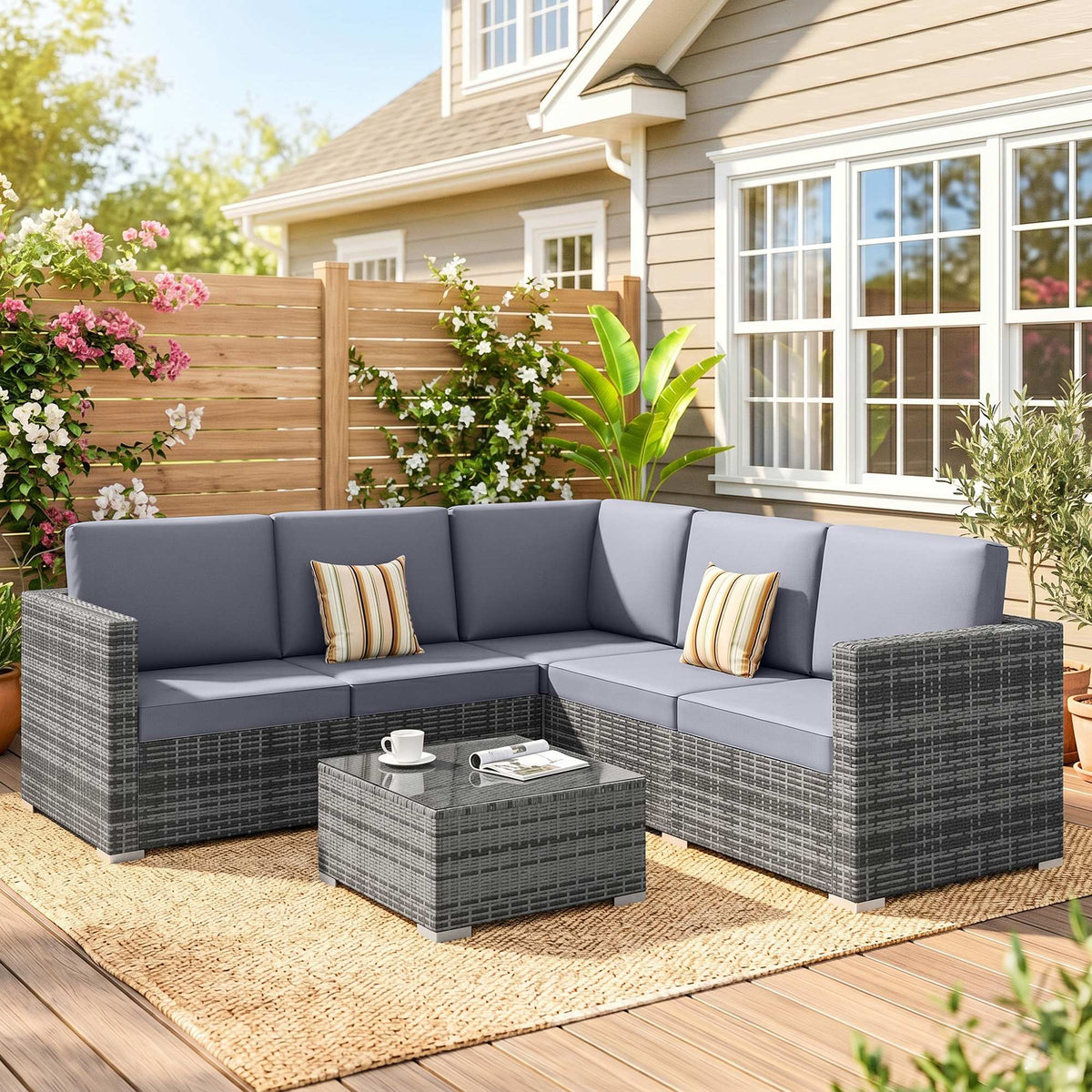 Outsunny Luxury 5 Seater Rattan Garden Furniture Set, 4 Pieces Outdoor Patio Conversation Set with Wide Seats, 220gsm Polyester Cushions, Tempered Glass Table, Corner Sofa, Loveseat, Grey