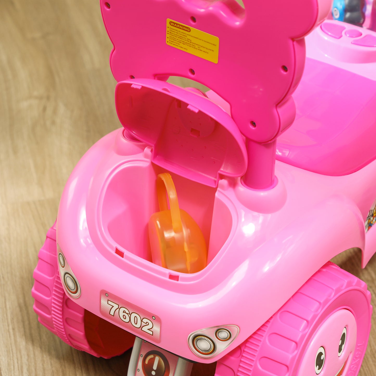 AIYAPLAY Foot to Floor toddler Ride on Toy w/ Music, Light, Horn, Under Seat Storage, Anti-Over-Backwards Device, Pink